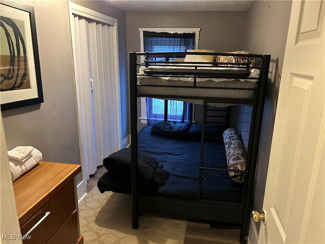 bedroom with a textured ceiling