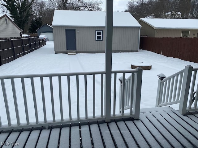 view of snow covered deck