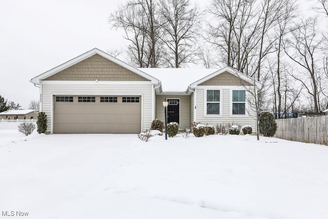 single story home with a garage