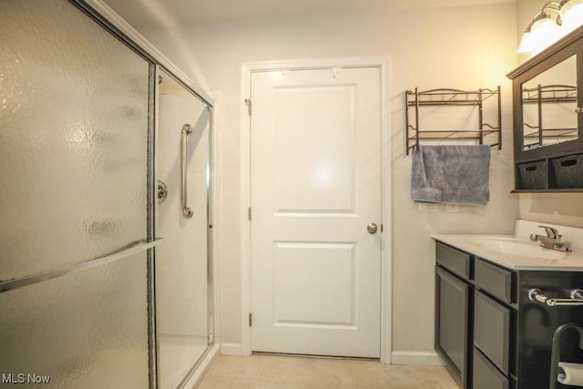 bathroom with vanity and walk in shower