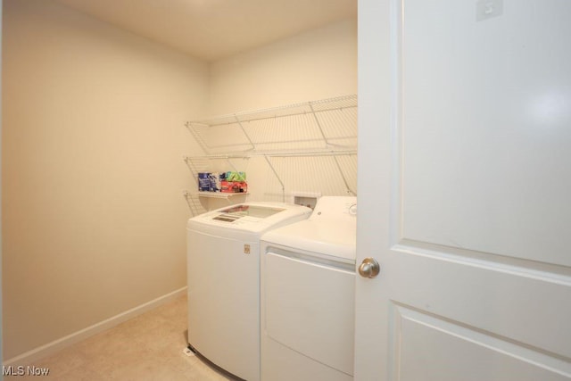 laundry area with washer and clothes dryer