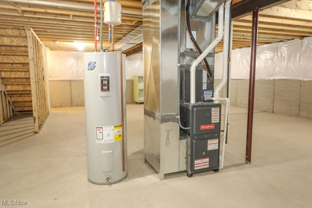 utility room featuring electric water heater and heating unit