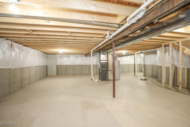 basement with heating unit and water heater