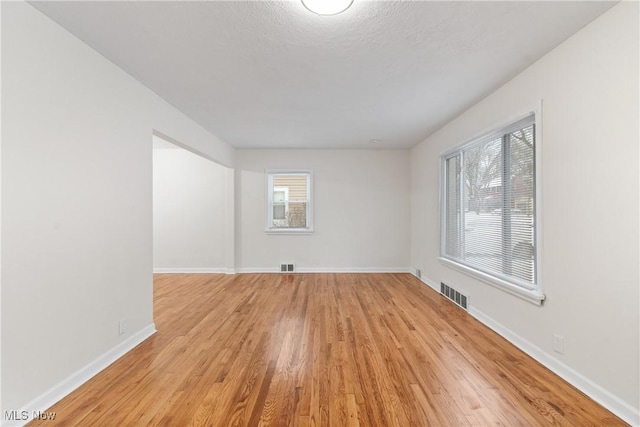 empty room featuring light hardwood / wood-style floors