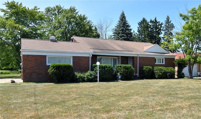 ranch-style home with a front yard