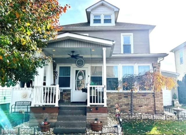 view of front of property with covered porch and ceiling fan