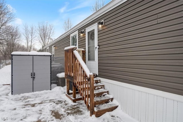 view of snow covered deck