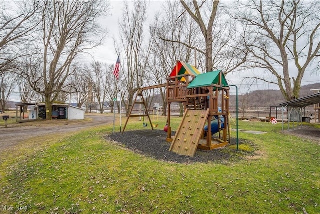 view of playground with a yard