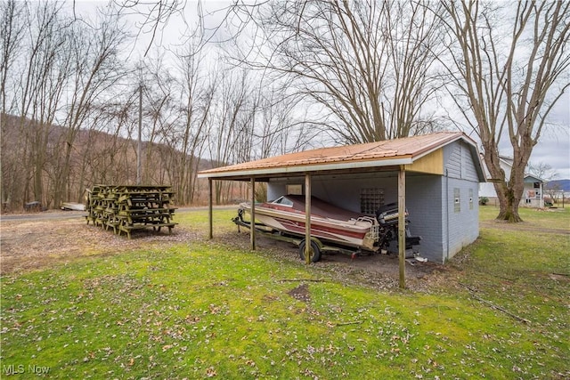 view of yard with a carport