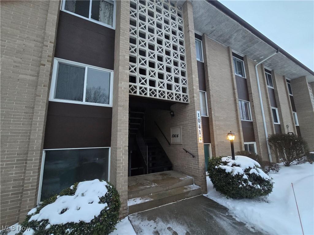 view of snow covered building