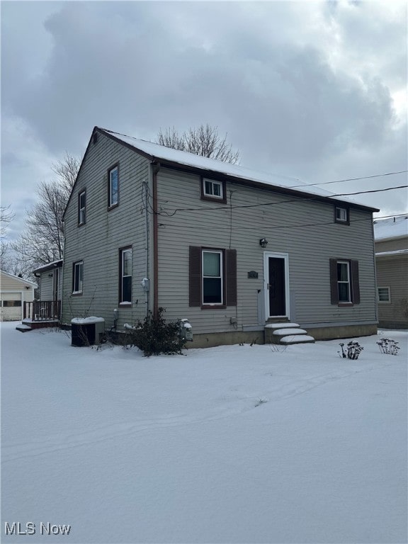 view of front of home with cooling unit