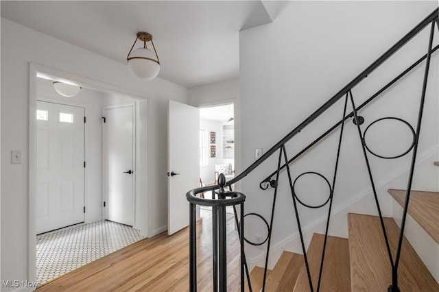 foyer with light hardwood / wood-style flooring