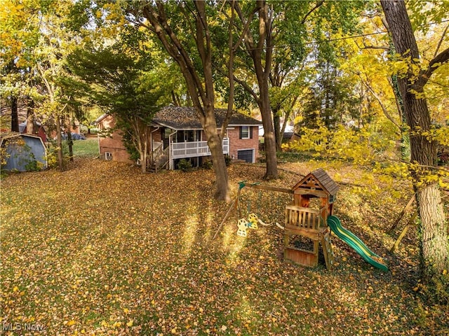 view of yard with a playground