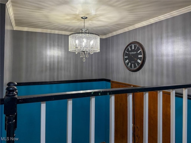 interior details featuring crown molding and a chandelier