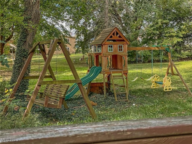 view of playground featuring a lawn