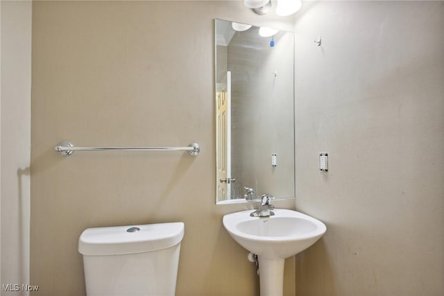 bathroom featuring toilet