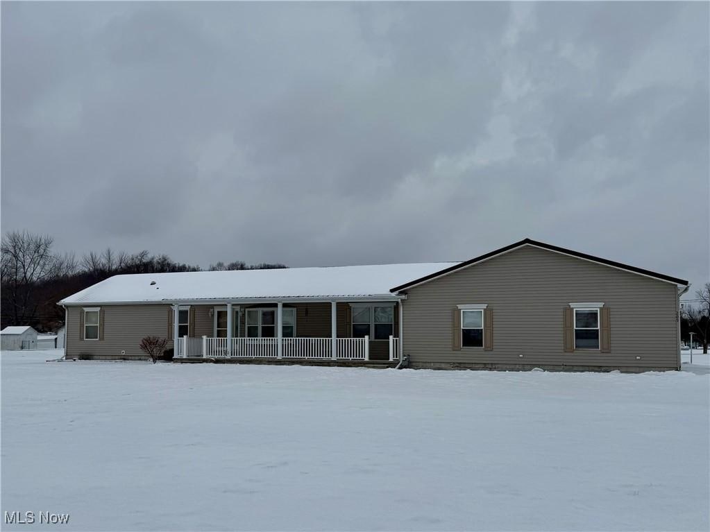 exterior space featuring covered porch