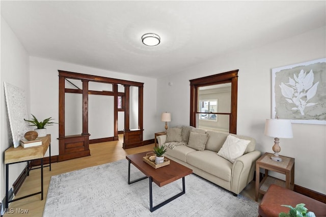 living room with light hardwood / wood-style flooring