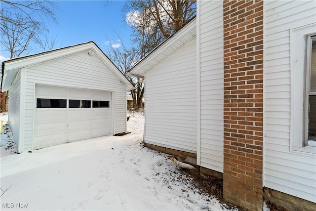 view of snow covered garage