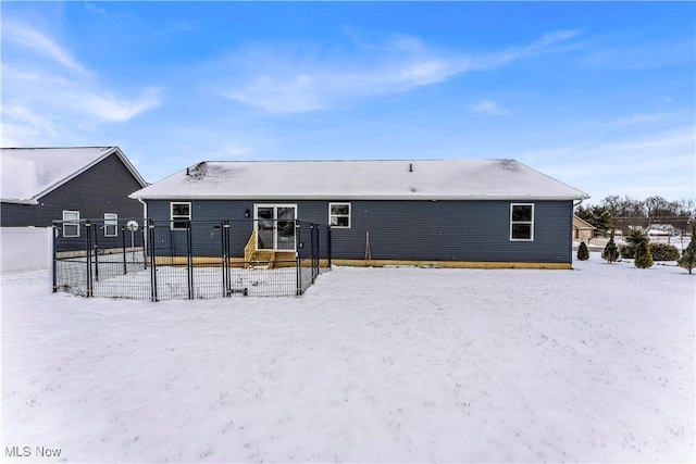 view of snow covered property