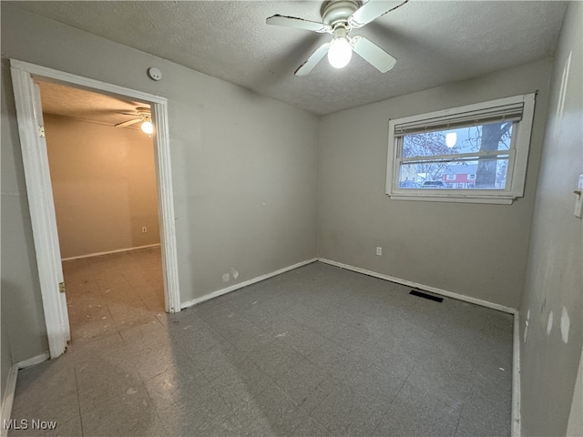 empty room with ceiling fan