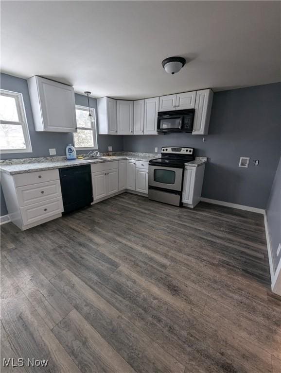 kitchen featuring white cabinets, pendant lighting, dark hardwood / wood-style flooring, and black appliances