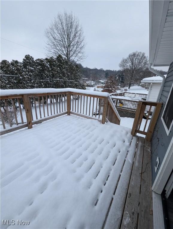 view of snow covered deck