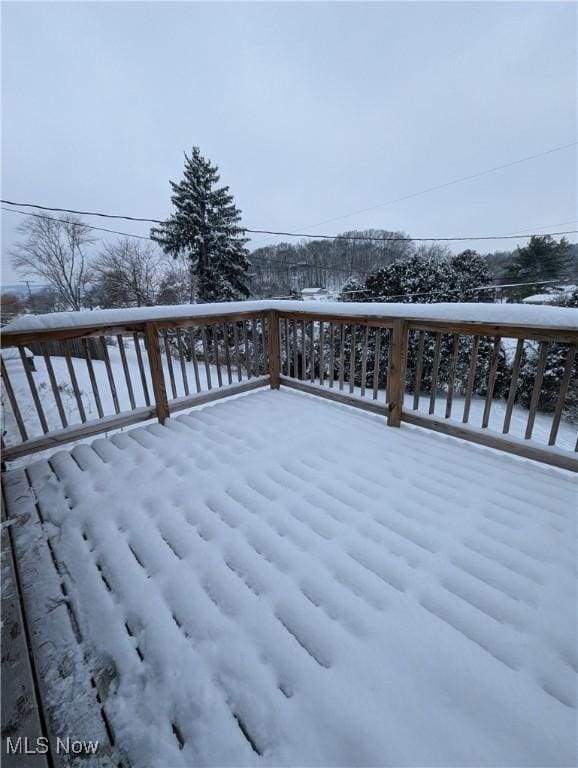 view of snow covered deck