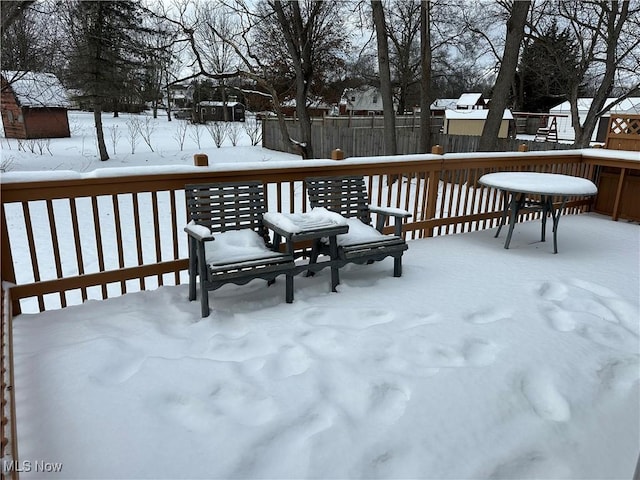 view of snow covered deck