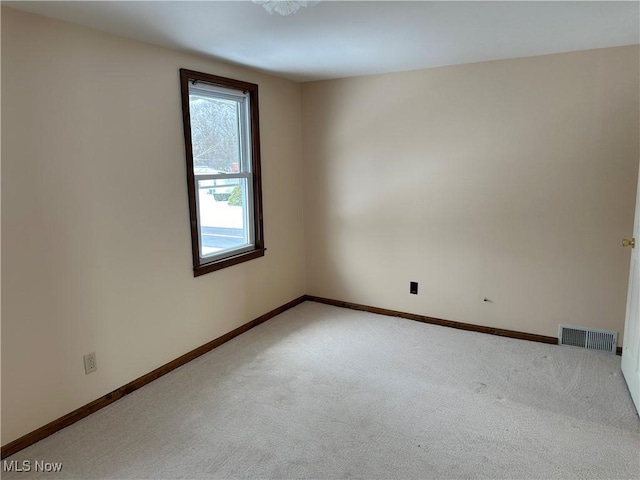 view of carpeted spare room