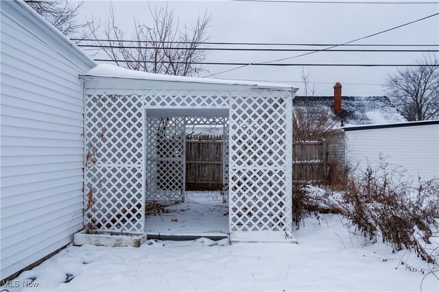 view of snow covered patio