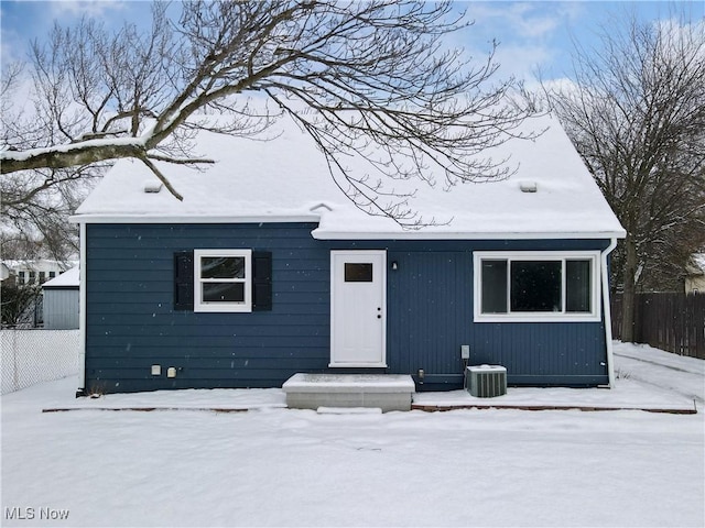 view of front of house featuring cooling unit