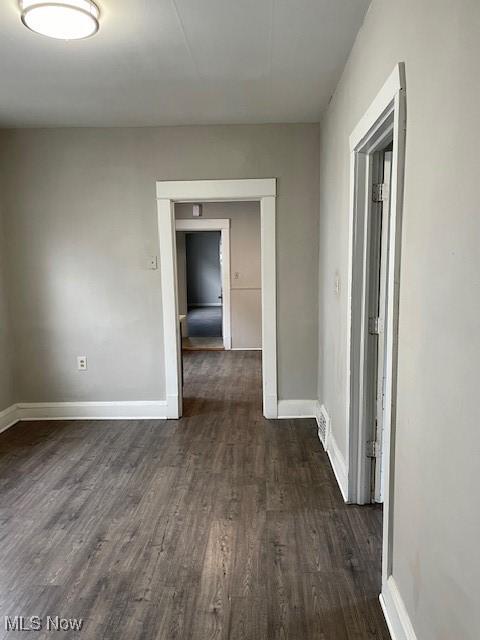 interior space with dark hardwood / wood-style flooring