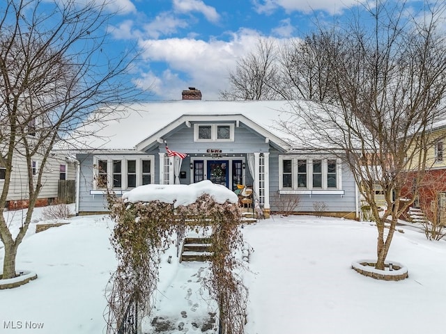 view of snow covered property