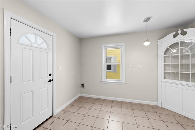 interior space featuring light tile patterned floors