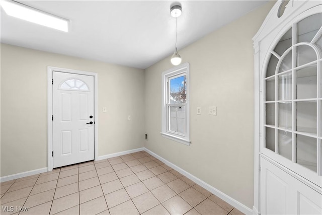 foyer with light tile patterned floors