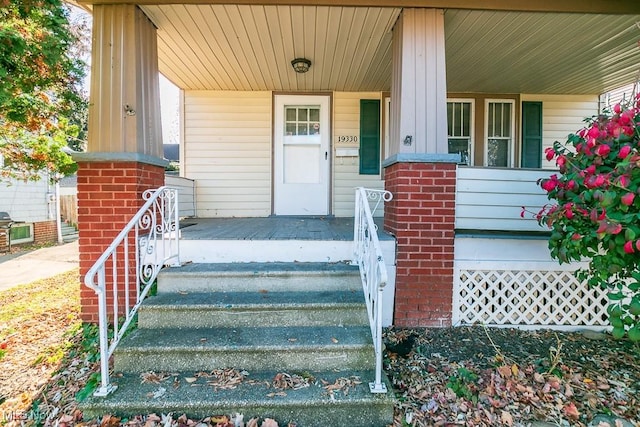 entrance to property with covered porch