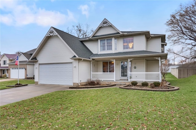 view of front of house with a garage, a porch, and a front yard