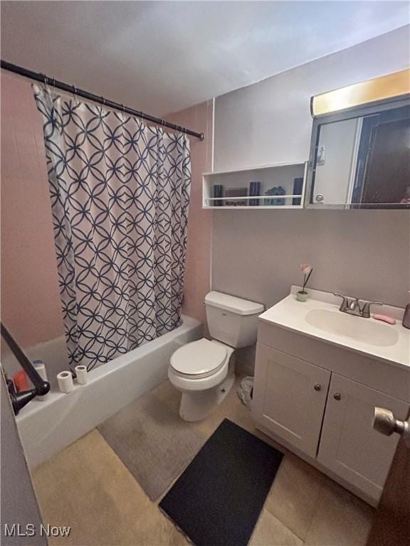 full bathroom with vanity, shower / bath combination with curtain, and toilet