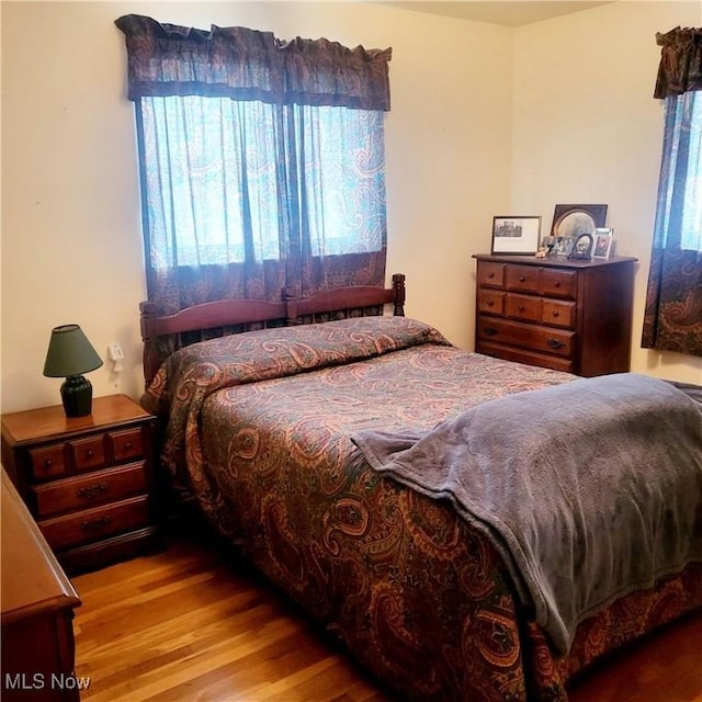 bedroom featuring light hardwood / wood-style flooring