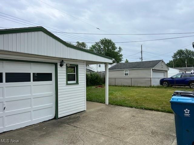 garage with a lawn