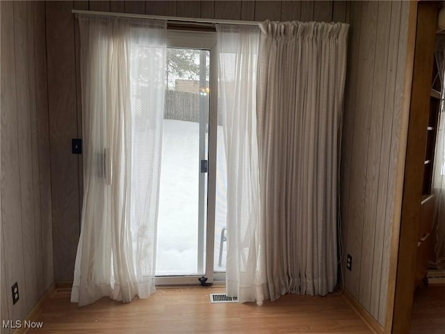 spare room featuring light wood-type flooring