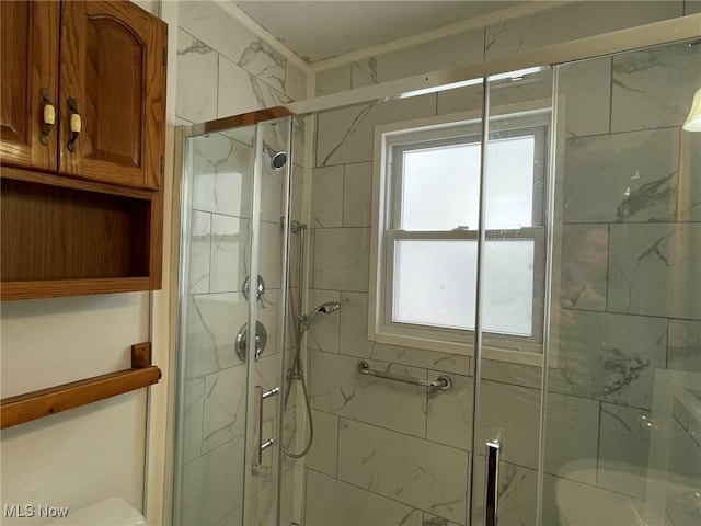 bathroom featuring walk in shower