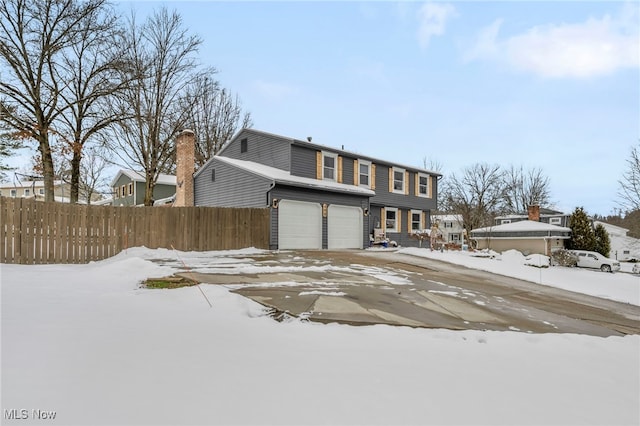 front of property featuring a garage