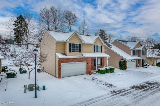 front of property with a garage