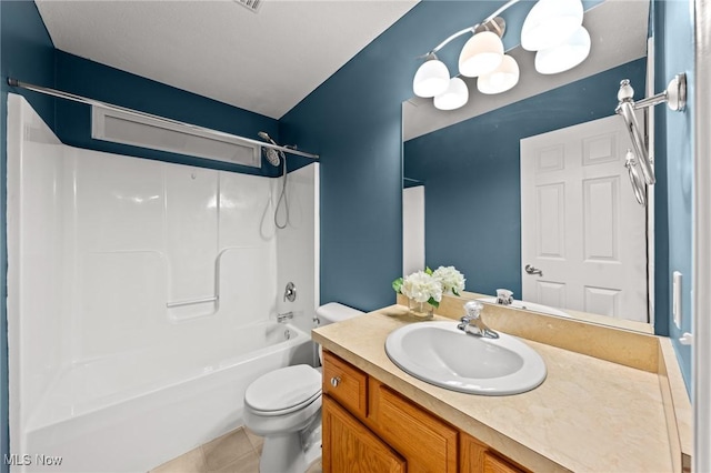 full bathroom with tile patterned flooring, vanity, bathing tub / shower combination, and toilet