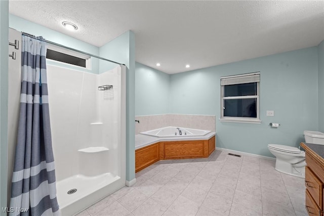 full bathroom featuring plus walk in shower, vanity, a textured ceiling, and toilet