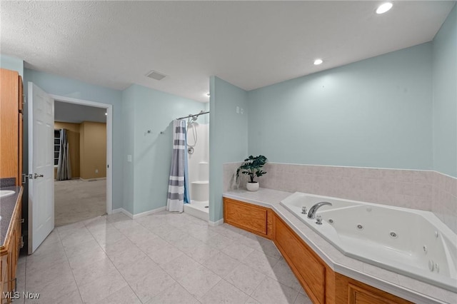 bathroom featuring a textured ceiling and plus walk in shower