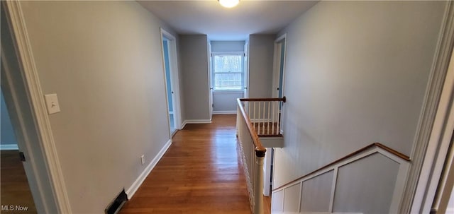 hallway featuring hardwood / wood-style floors