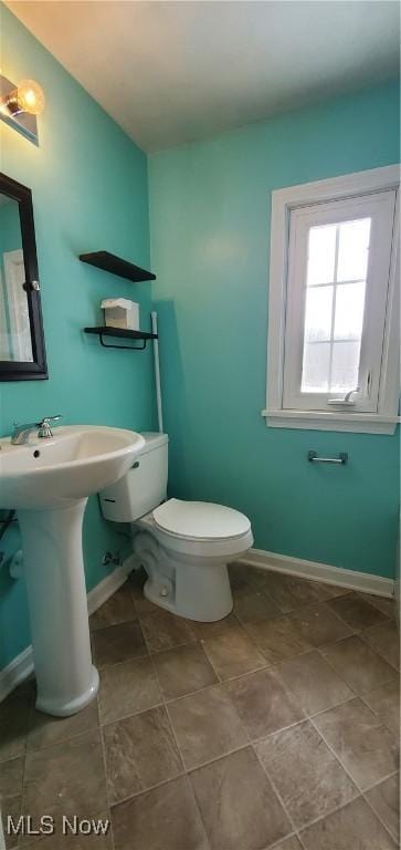 bathroom with toilet and sink